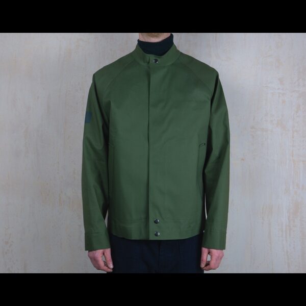 Front-Model-Wearing-Green-Waterproof-Rain-Jacket-By-Rainford-Apparel