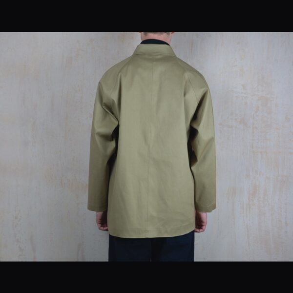 Back-View-Of-Model-Wearing-Waterproof-Caramac-Raincoat-By-Rainford-Apparel
