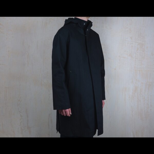 Side-View-Of-Model-Wearing-Waterproof-Weatherall-Rain-Parka-By-Rainford-Apparel